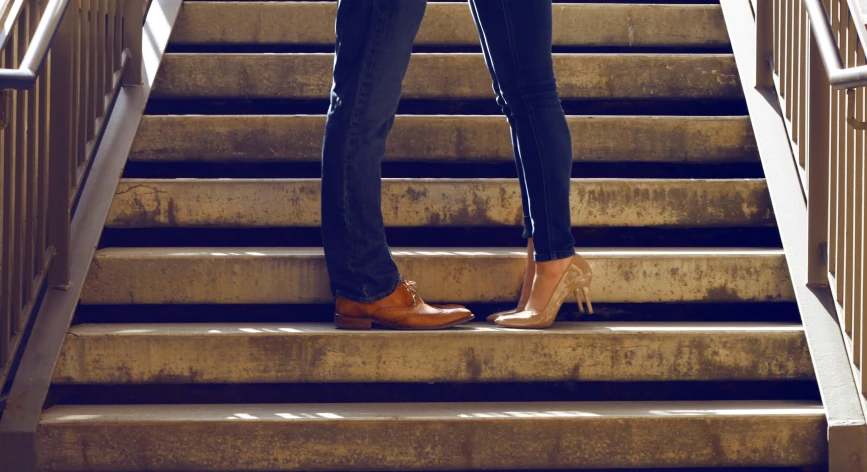 an image of a woman standing on the steps