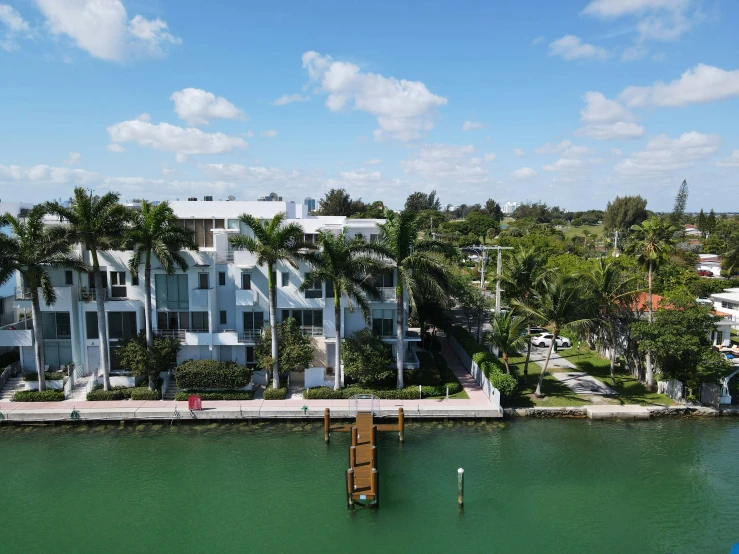 an aerial s of an apartment building on a waterfront