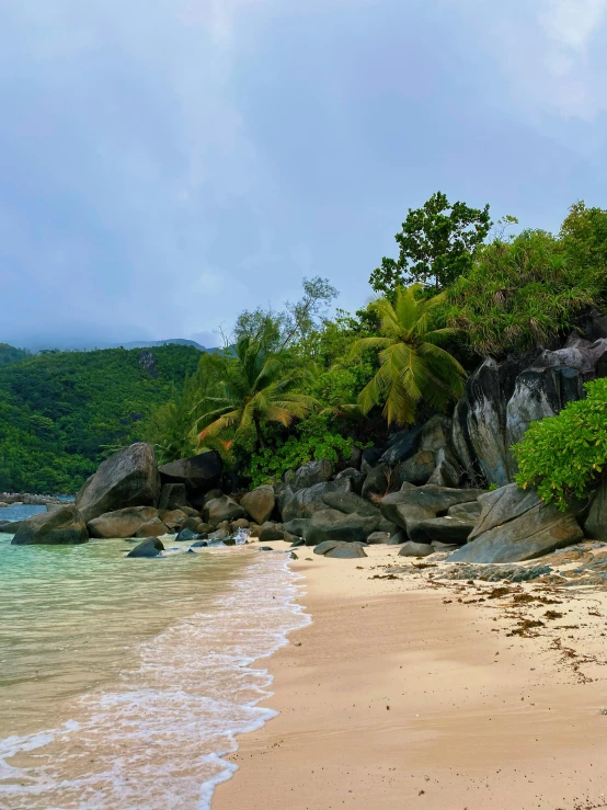 an idyllic view of a rocky beach on the coast