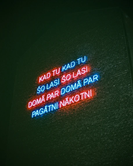 a neon sign in italian with other words