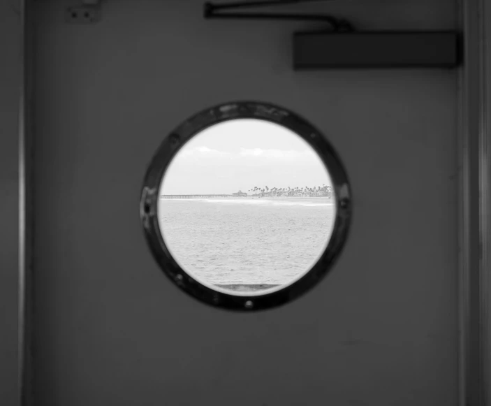 a view from a port hole on a boat