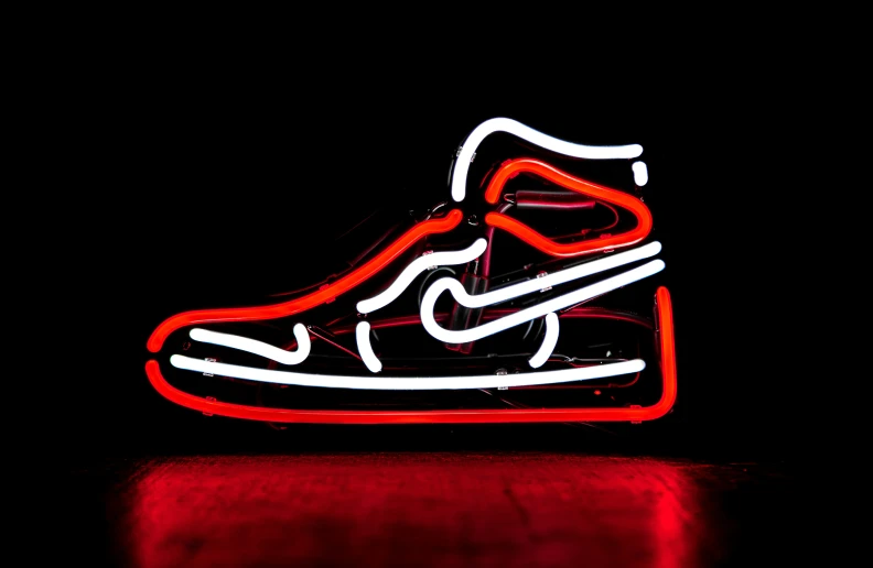 a shoe with the word nike lit up
