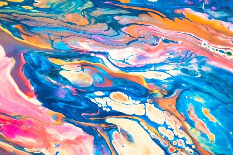 a large colorful abstract painting made of fluid paint