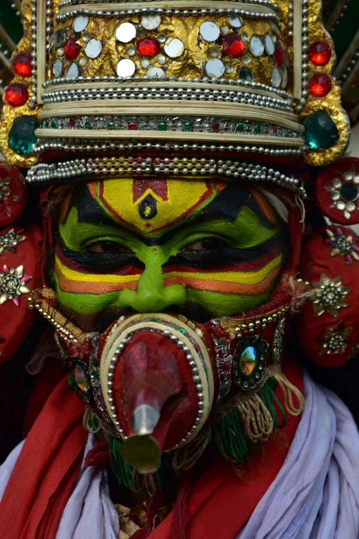 an indian festival with painted faces and headgear