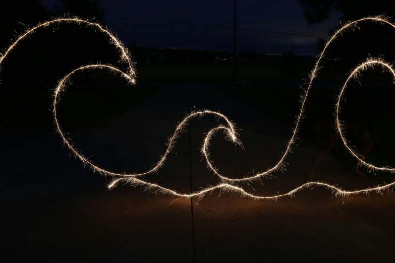 a large long spiral made of lights and long exposure