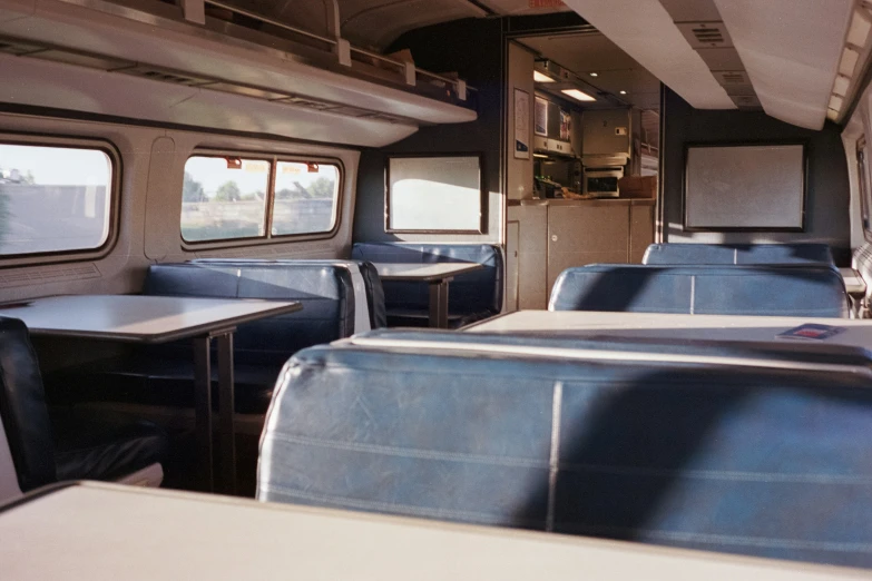 a restaurant car with many seats and counter top