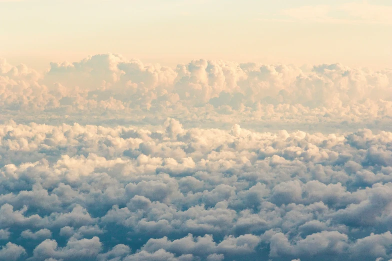 an aerial view from a jetliner that is in the air