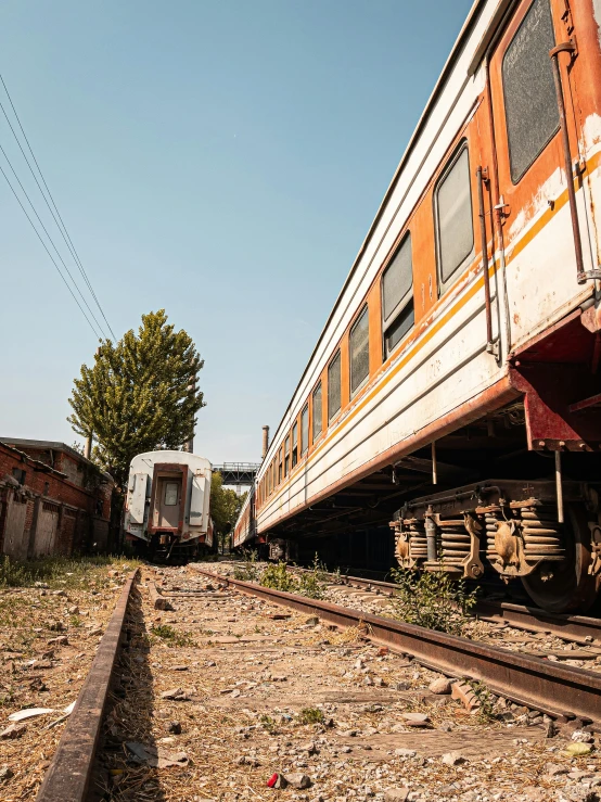 abandoned train cars are left out on the tracks