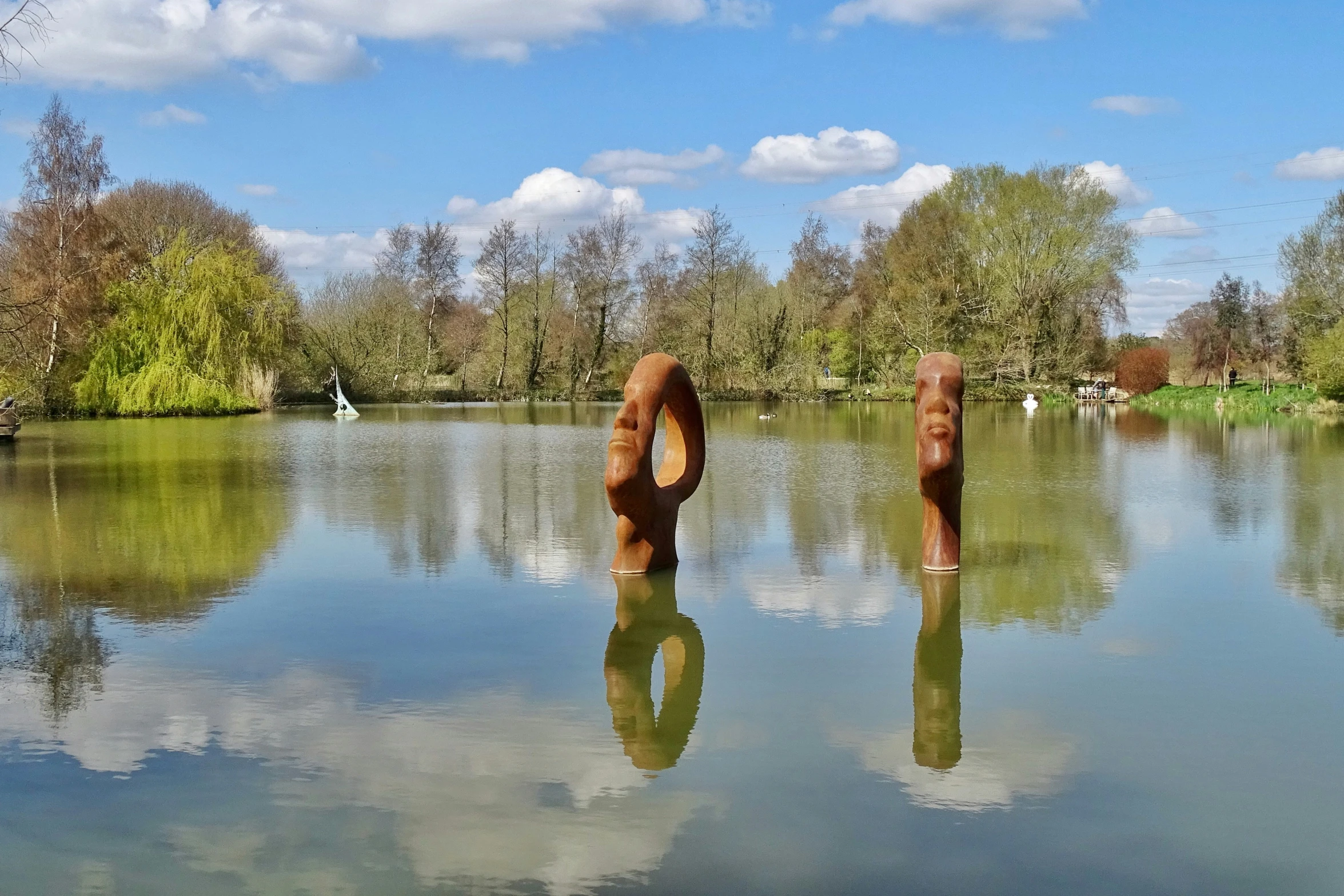 some sort of round statue in a body of water