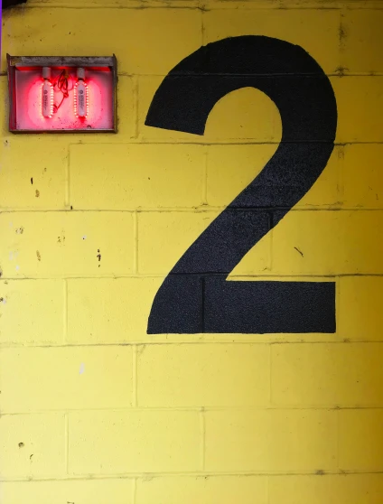 the numbers two are displayed on the wall