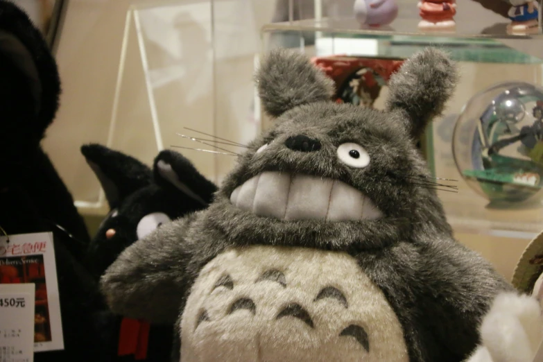 stuffed animals with teeth are on display at an event