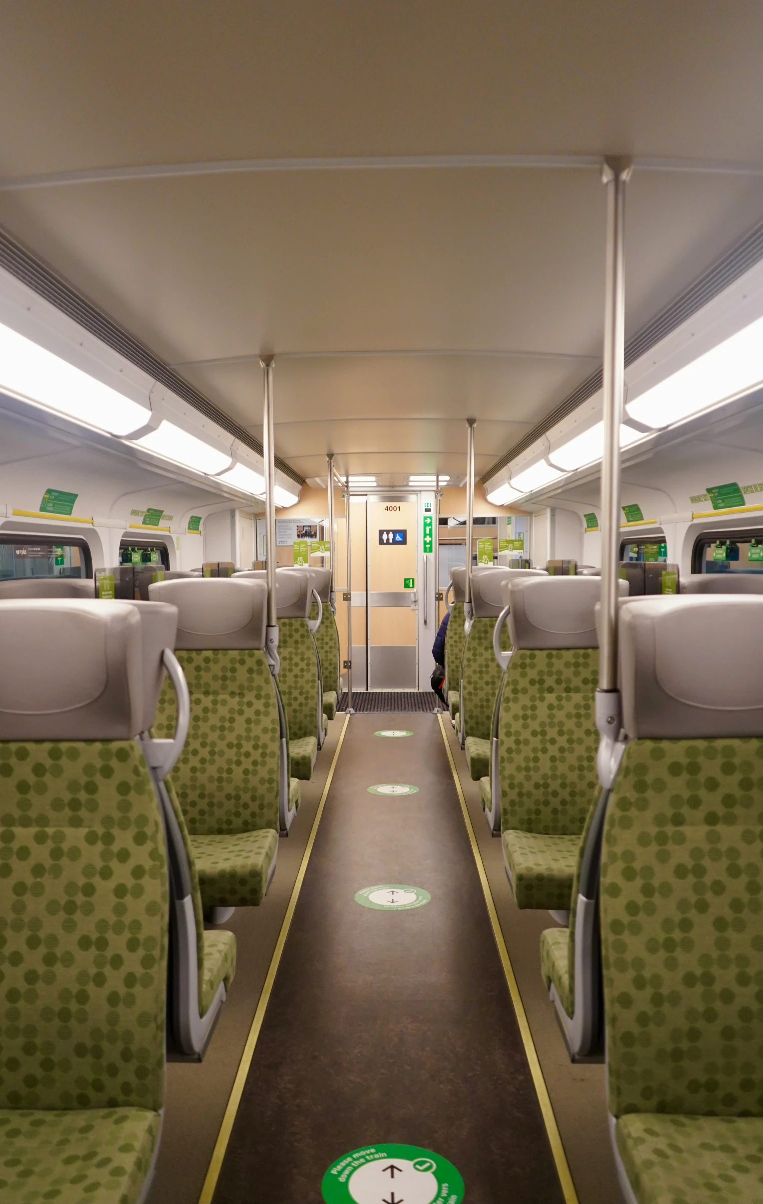 there are many empty chairs in this public train