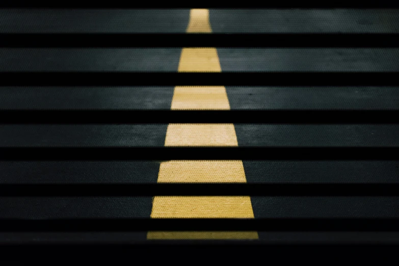 the shadow of a line and cross walk appears