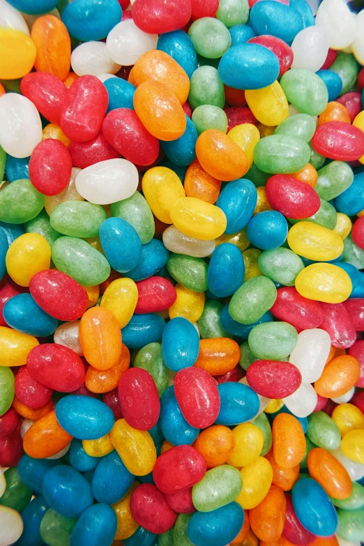 multi colored candy beans are grouped close together