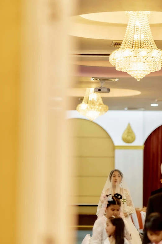 a man and woman standing next to each other on a staircase