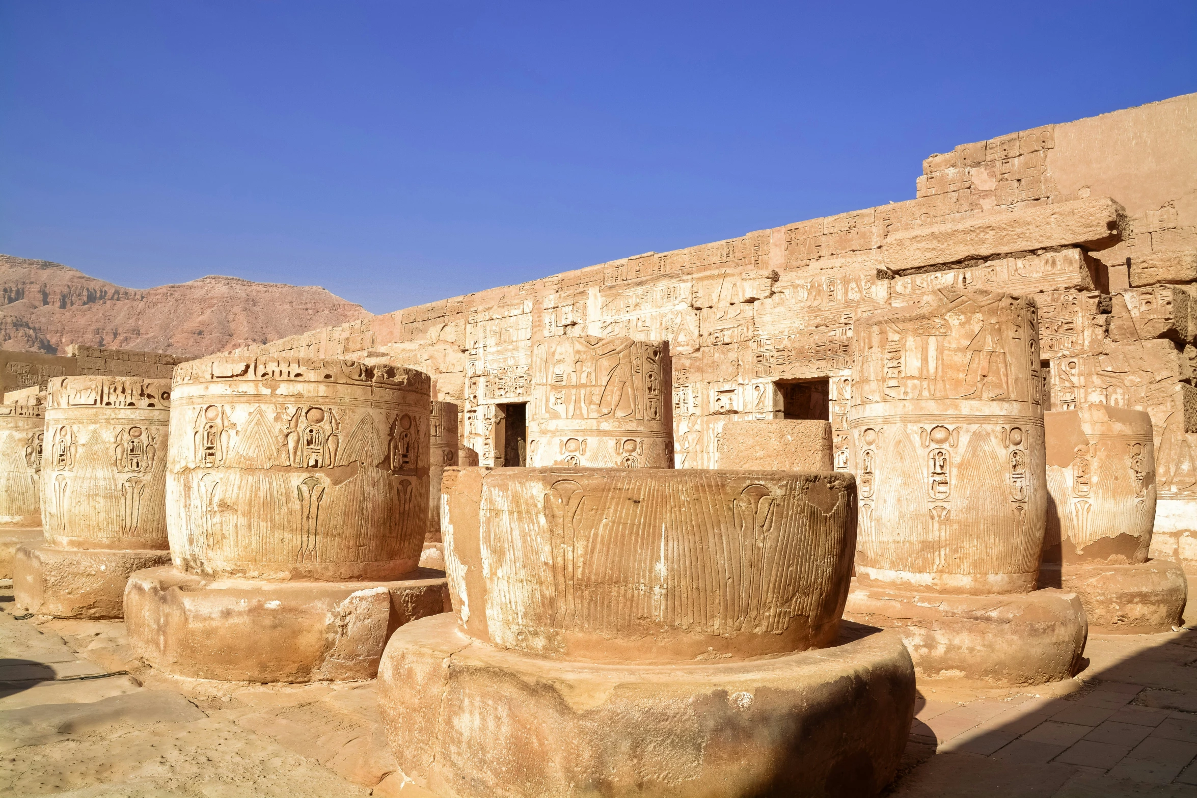 the ancient ruins have carved stencular faces to tell if they are real or fake