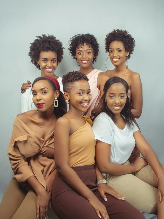 a group of young women, all smiling