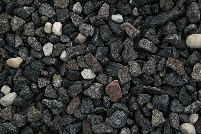 rocks and gravel are scattered in various colors