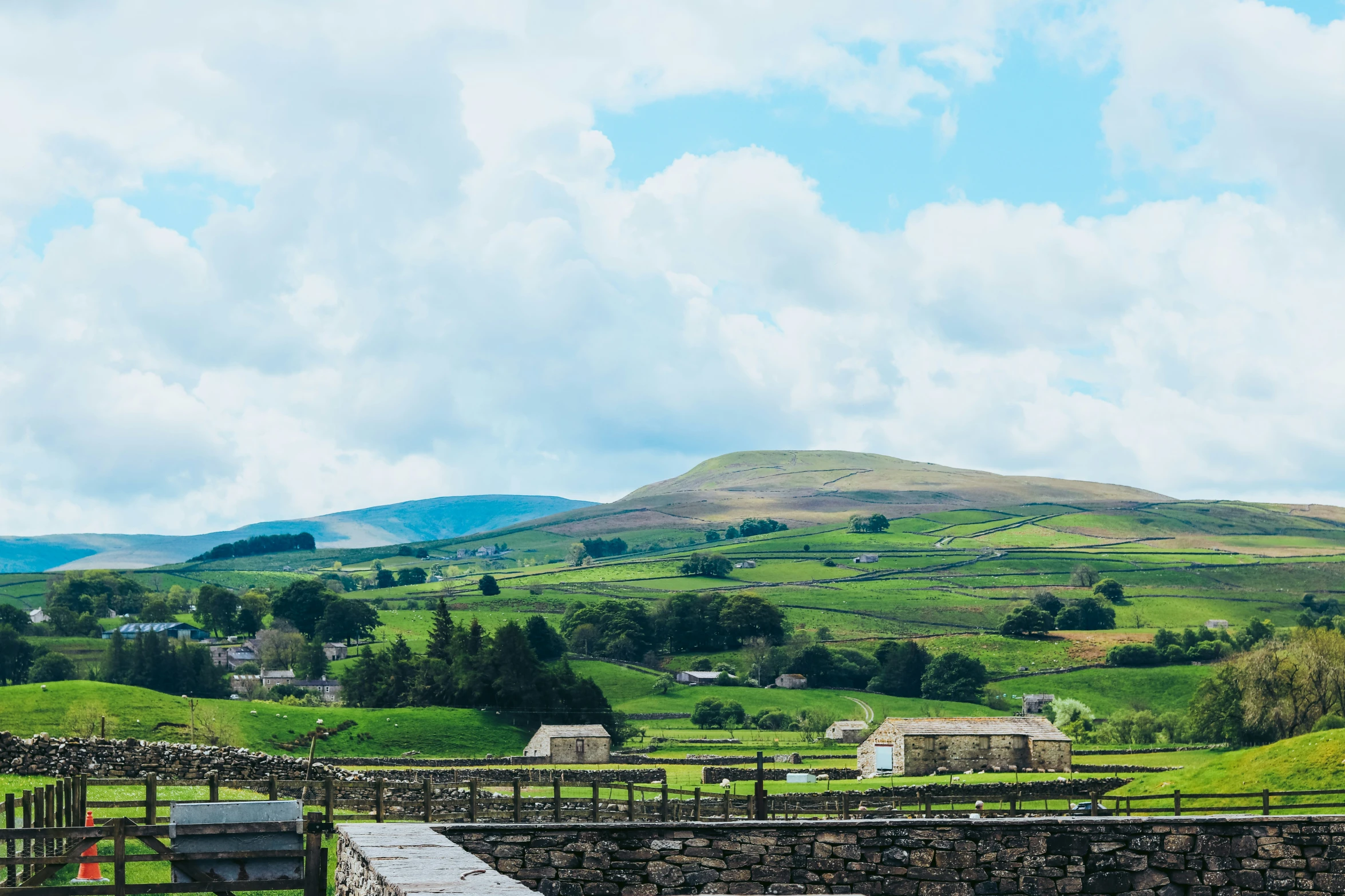 a rural country landscape with rolling hills