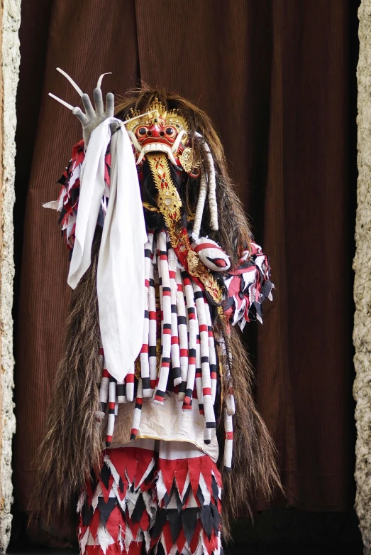 the cloth is decorated in many different colors