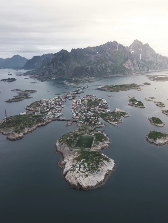 an aerial view of the coastal region with several small village on islands