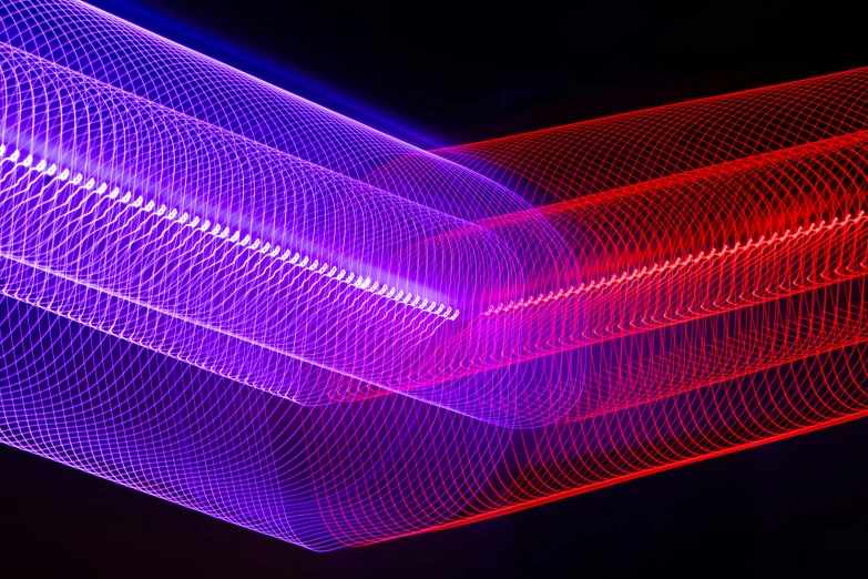 red and purple lights are blurred as the lines are made