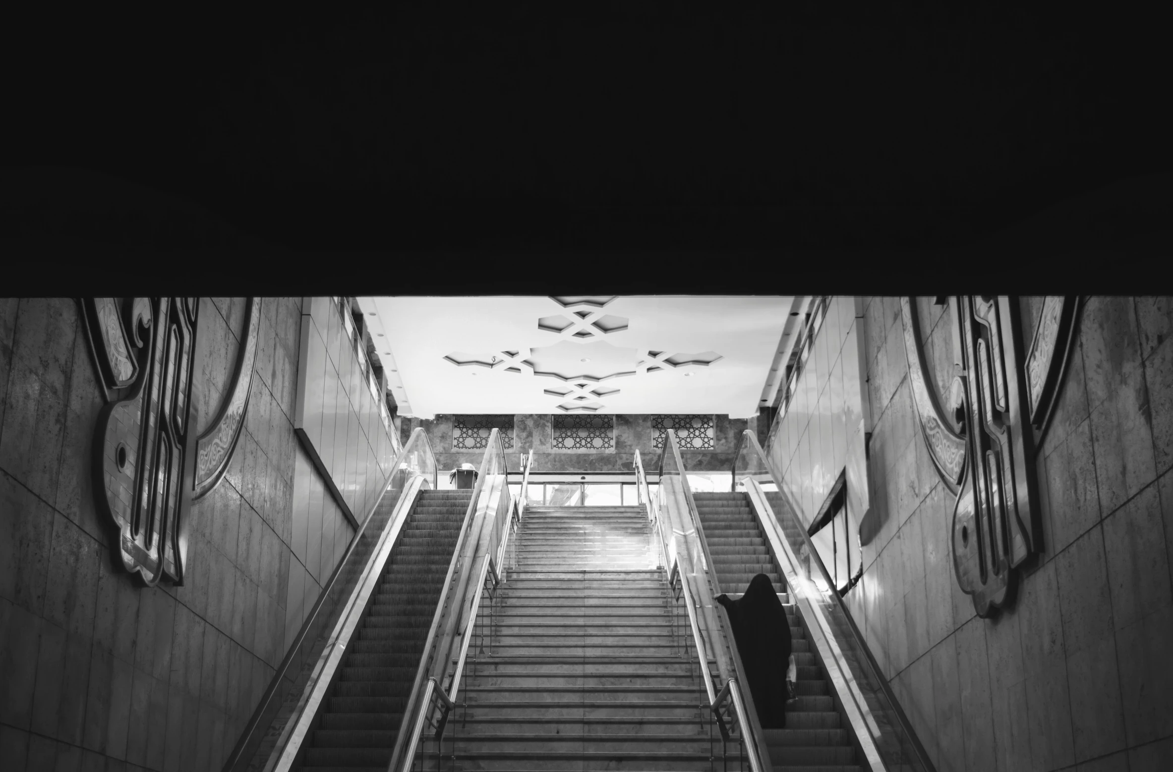 a staircase leading to another floor filled with stairs