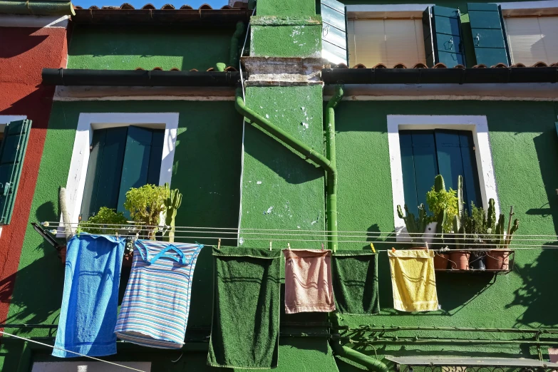 some towels are hanging out to dry off