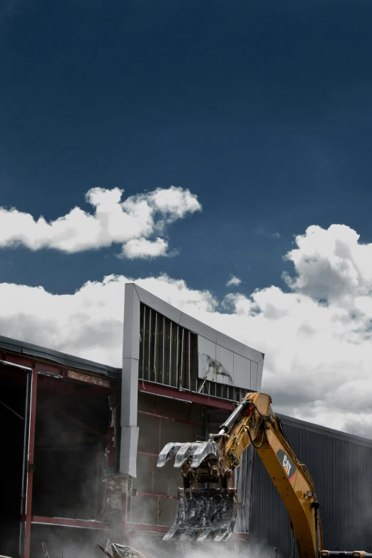 the back end of a heavy construction vehicle working