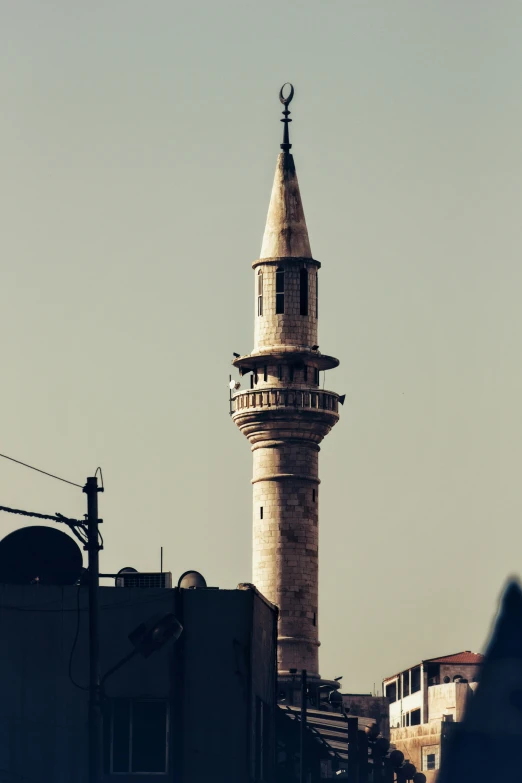 a tall building with a steeple in the middle