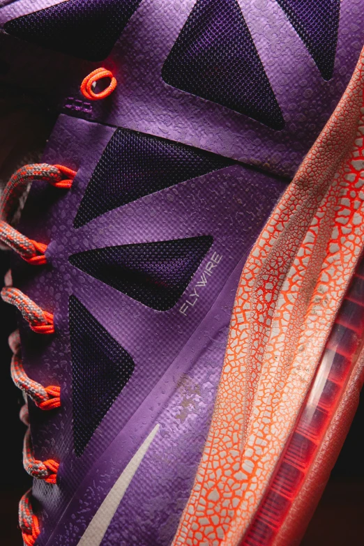 the new purple shoe has red and orange laces