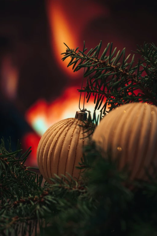 an ornament ornament and pine tree nches