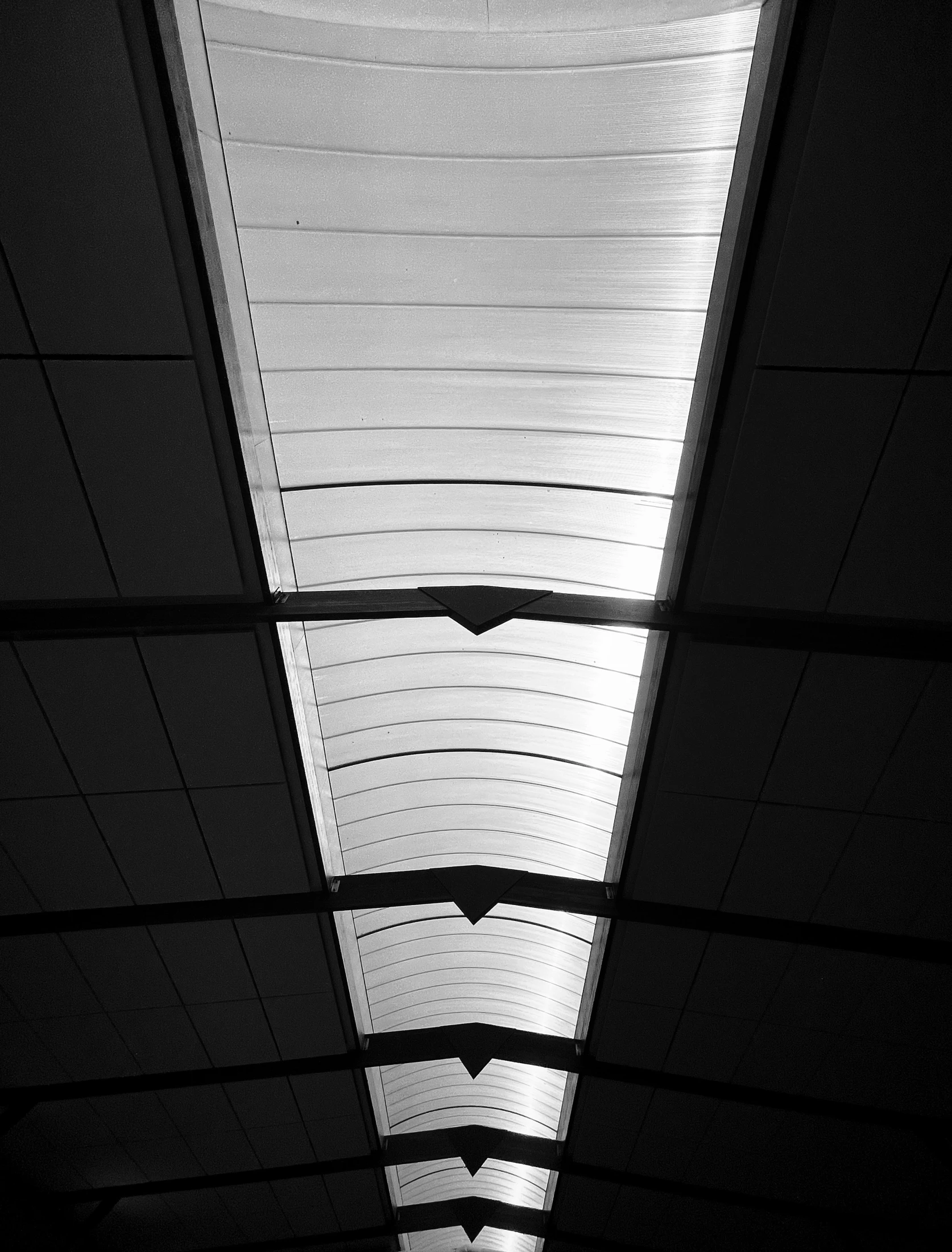 a po taken looking down the ceiling of an empty building