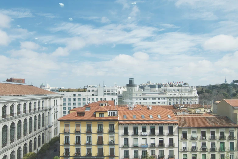 several multi - story buildings next to each other against the sky