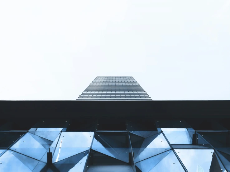 a tall building with lots of glass doors