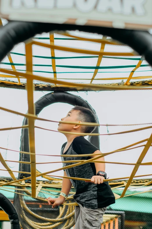  standing in front of an obstacle course