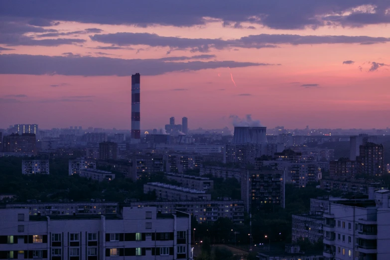 purple sky over city at night with no cars