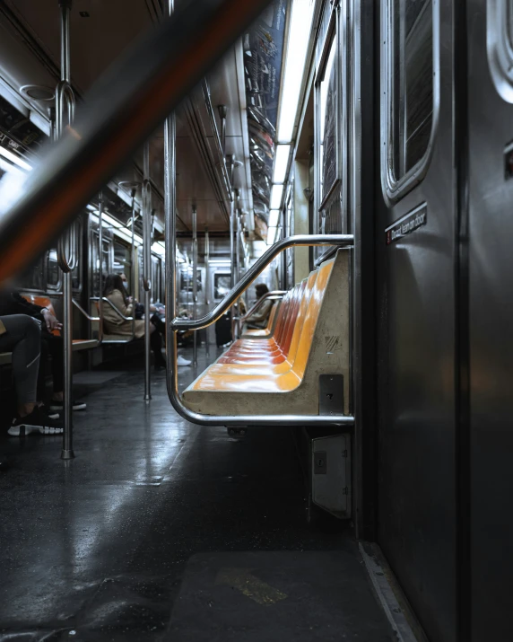 the bench seat on the train is empty