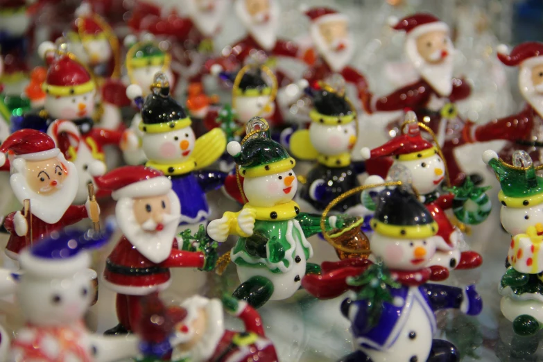 a large collection of figurines of different styles and colors