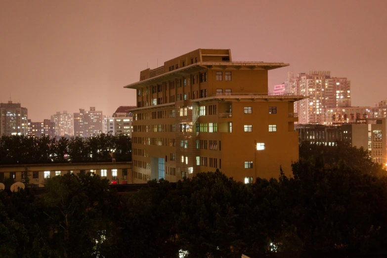 a city skyline seen at night from afar