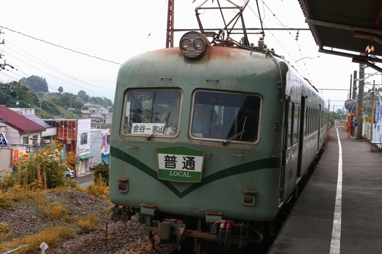 the train is stopped at the railroad station