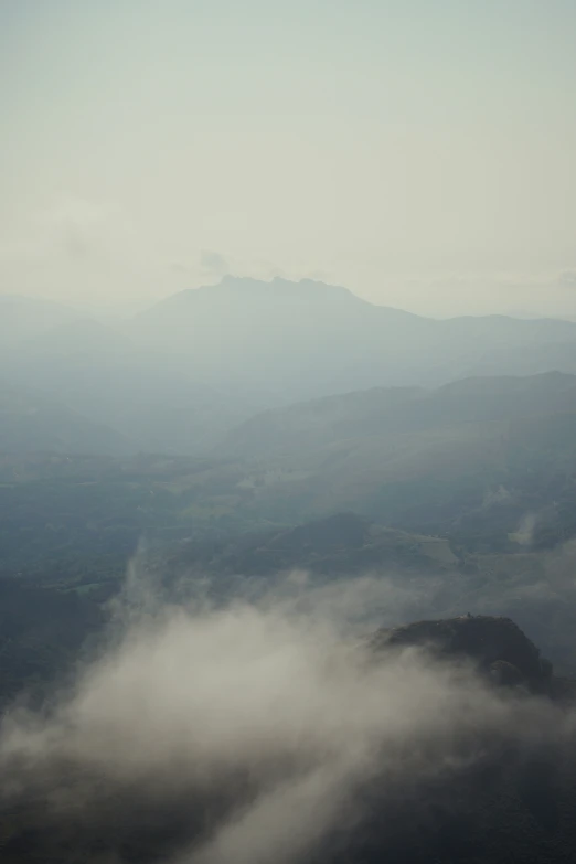 a view of some mountains from the air