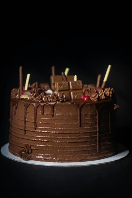 chocolate cake with frosting on a plate