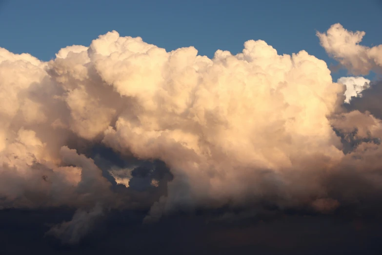 some clouds that are next to each other