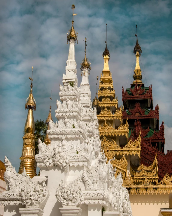 a variety of white and gold structures and spires