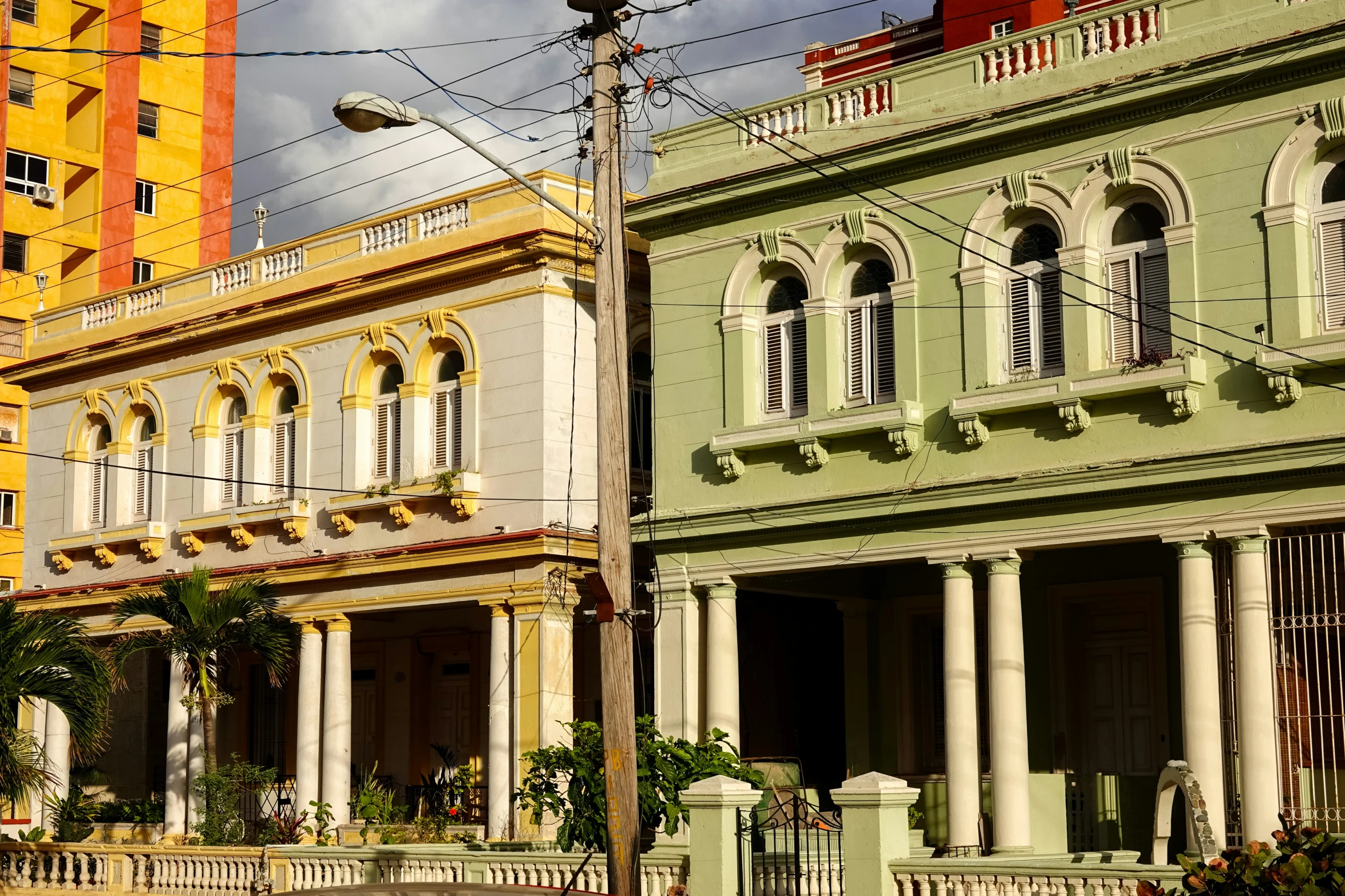 two buildings are in different colors and shapes