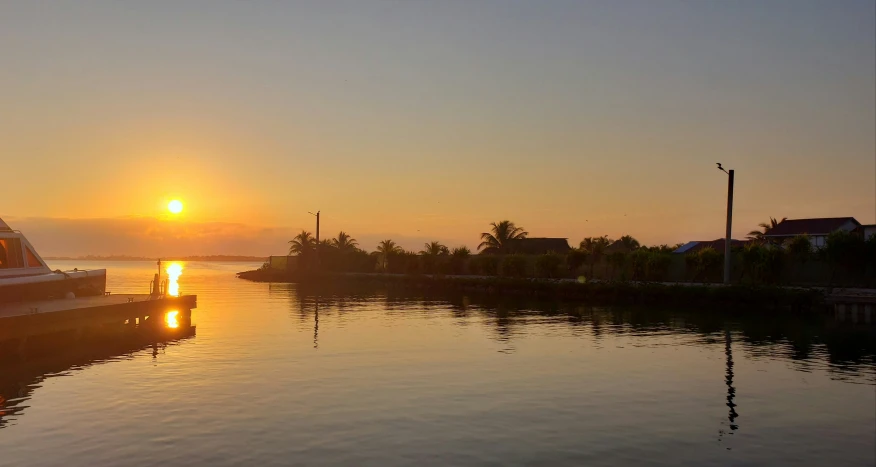 sunset from a boat in the lake during daytime