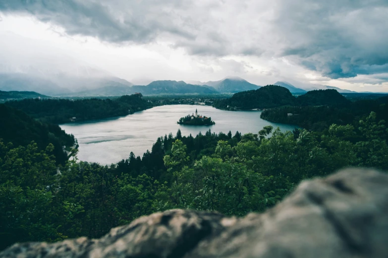 a lake is in the middle of some trees