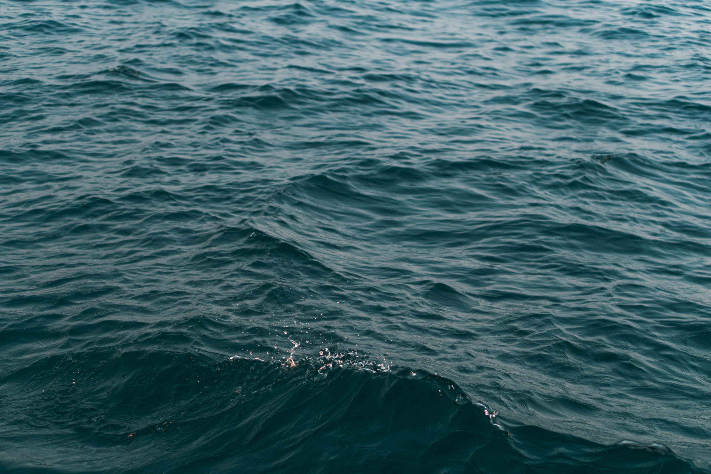 a water surface covered with small waves