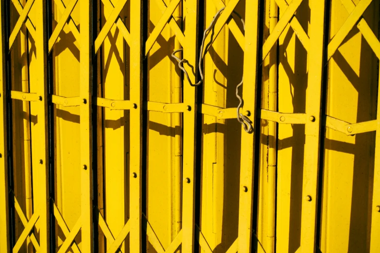 close up of fence with many metal bars